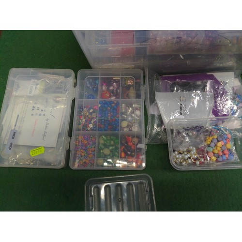 168 - Plastic container with jewelry making beads, fastenings, pendant etc.., 