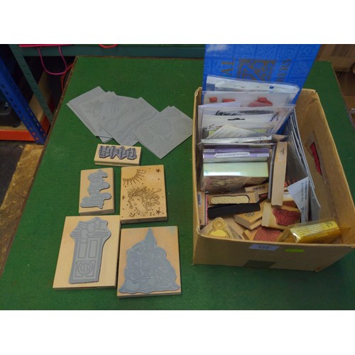 173 - Small box with card making stamps instruction dvds, stencils Inc some christmas items 