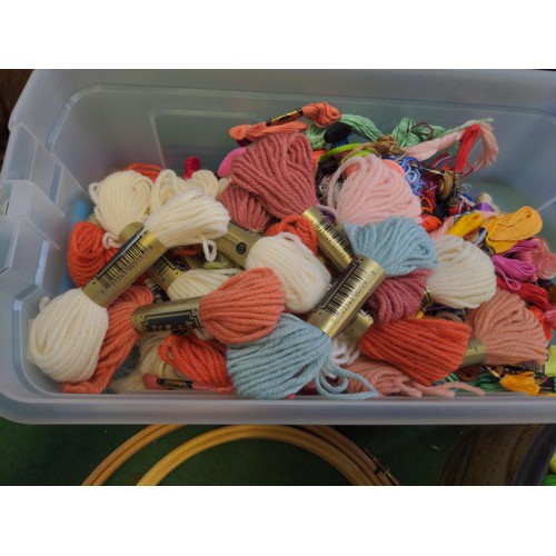 228 - Small plastic tub containing embroidery silks, tapestry wool etc.