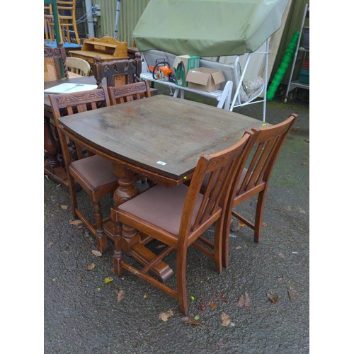 33 - Oak extending table with 4 chairs
