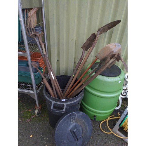 82 - Quantity of long handled tools & black plastic bin with lid
