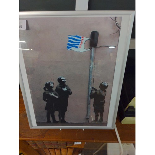 530 - Two framed Banksy prints 29 x 36cm