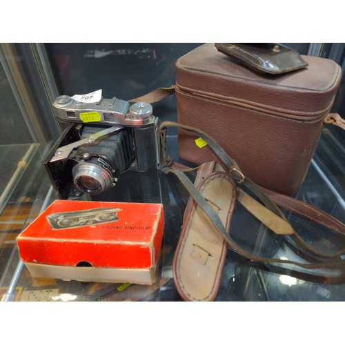 707 - Balda Baldix German folding camera together with some accessories in a leather case.