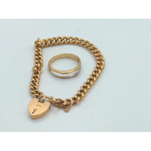 658 - 9ct gold bracelet with heart lock and safety chain. 190mm, weighing 11.4g together with a scrap 9ct ... 