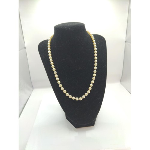 662 - Single strand cultured pearl necklace with a 9ct gold marked clasp. Length 920mm. Weight 22g