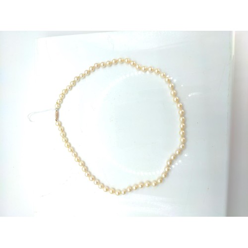 662 - Single strand cultured pearl necklace with a 9ct gold marked clasp. Length 920mm. Weight 22g