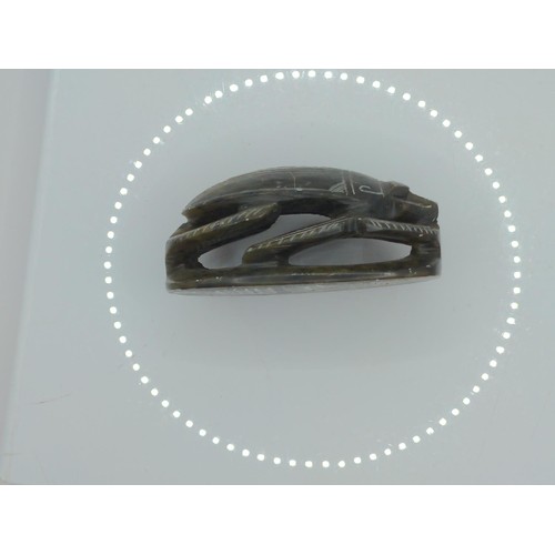 694 - Carved soapstone Egyptian scarab beetle, hieroglyphs to underside, length 10.2cm