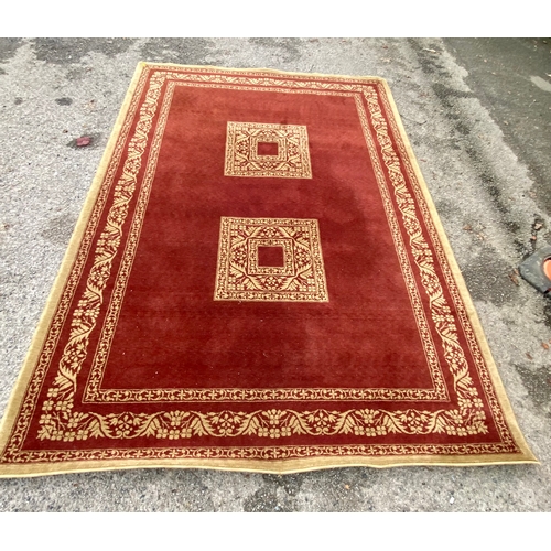 Large Egyptian 100% wool rug with double centre square lozenge and surrounding border in red and cream. 2.4 mtr 3.4 mtr