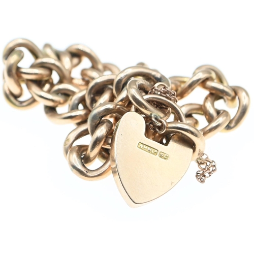 53 - 9ct gold curb link bracelet with heart-shaped clasp and a safety chain, each link stamped, gross wei... 