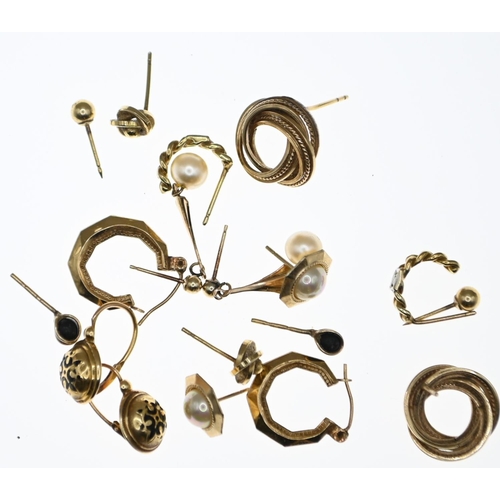 60 - Nine pairs of yellow metal earrings, including diamond set, together with 14 mismatched non gold but... 