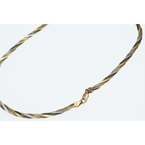 67 - 9ct gold tri-colour flat twist necklace, length 410mm, 6.61 grams