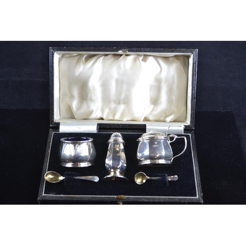 176 - Three piece silver cruet set, Barker Brothers Silver Ltd, Birmingham 1933-34, with salt and mustard ... 