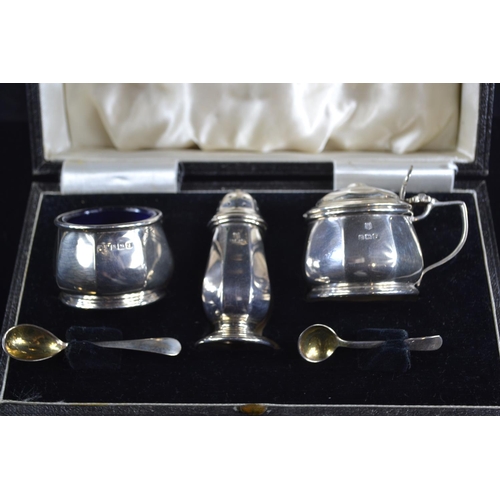 176 - Three piece silver cruet set, Barker Brothers Silver Ltd, Birmingham 1933-34, with salt and mustard ... 