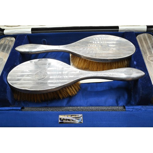 169 - Cased silver backed engine-turned part dressing table set, A & J Zimmerman Ltd, Birmingham 1923-... 