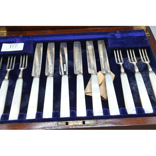 177 - Cased set of twelve pairs of silver fruit knives and forks with mother-of-pearl handles, John Henry ... 