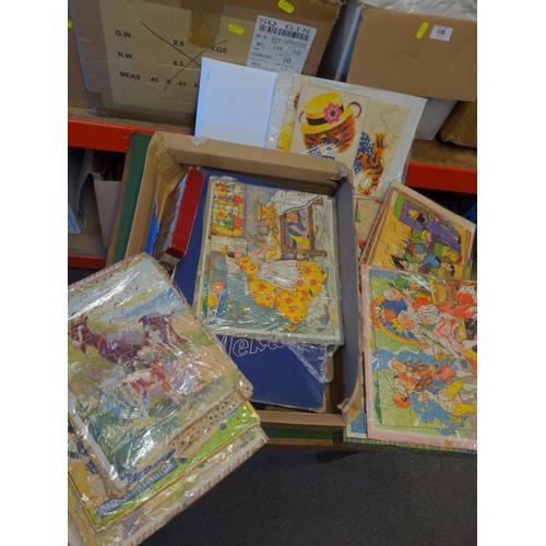 99 - Box of vintage jigsaw puzzles.