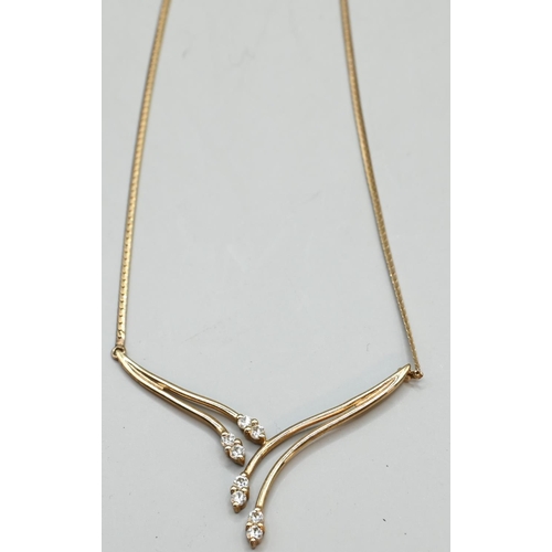 62A - 9ct gold flat snake pendant necklace, the pendant set with CZ, circumference approximately 440mm, gr... 