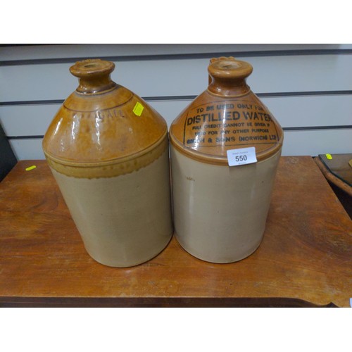 550 - Two stoneware jars inc. 'Distilled Water, Smith & Sons, Norwich', height 32cm approx.