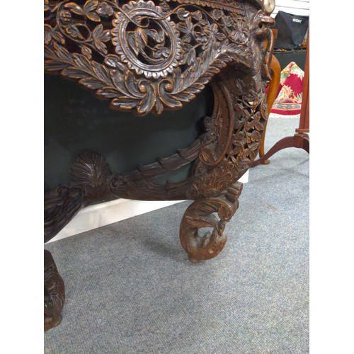 556 - Burmese hardwood demi lune console or hall table carved with leopards, exotic birds and foliage on l... 