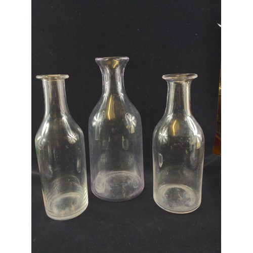 634 - Three French cider carafes, tallest 35cm