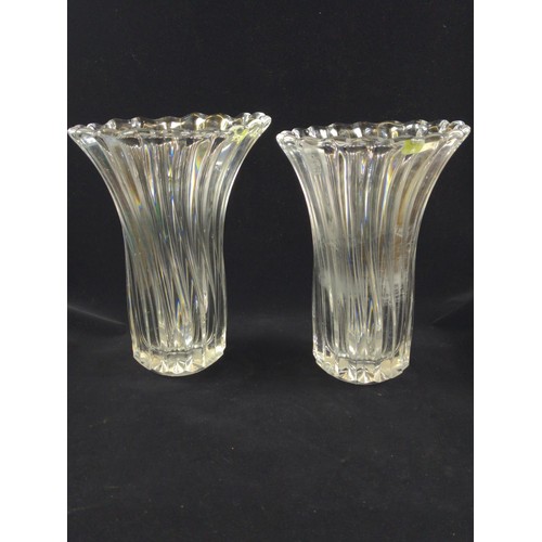 635 - Two heavy glass vases, height 29.5cm