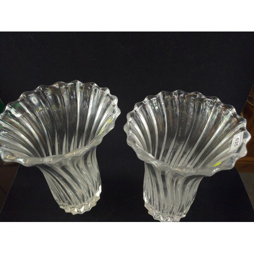 635 - Two heavy glass vases, height 29.5cm