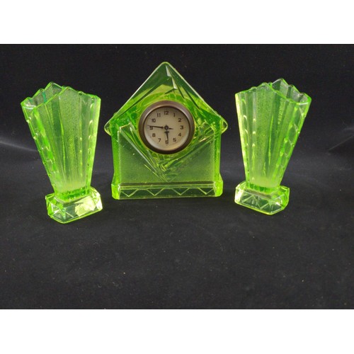 636 - Art Deco pressed uranium style glass clock with garniture