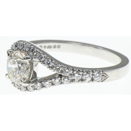 1031 - Platinum and diamond ring, the diamonds together weighing approximately 1.53 carats, marked 950, siz... 