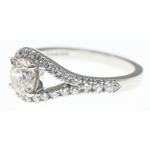 1031 - Platinum and diamond ring, the diamonds together weighing approximately 1.53 carats, marked 950, siz... 