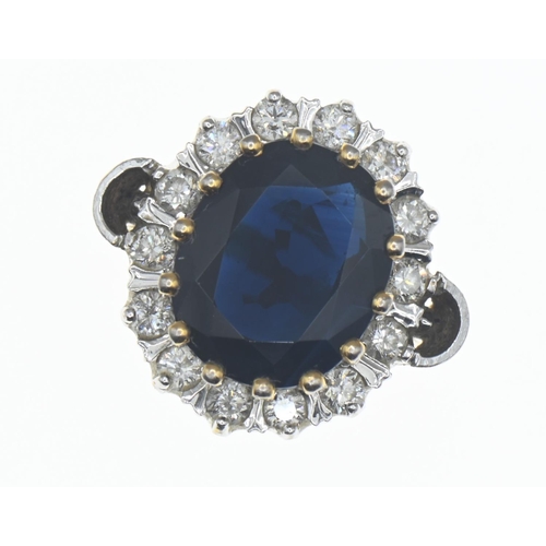 1032 - 18ct gold, sapphire and diamond cluster ring, size N, gross weight 9.28 grams