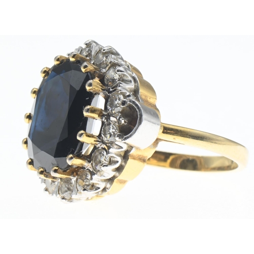 1032 - 18ct gold, sapphire and diamond cluster ring, size N, gross weight 9.28 grams