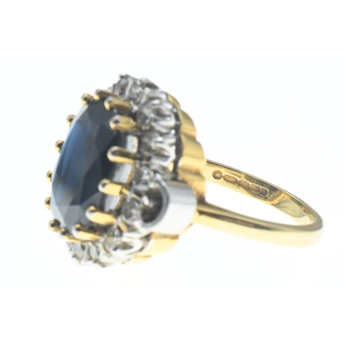 1032 - 18ct gold, sapphire and diamond cluster ring, size N, gross weight 9.28 grams