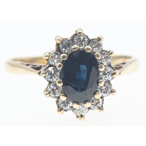 1034 - 9ct gold, sapphire and CZ ring, size L1/2, gross weight 2.4 grams