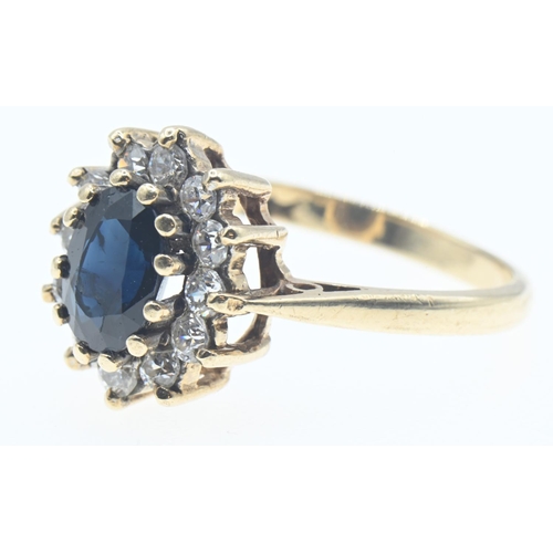 1034 - 9ct gold, sapphire and CZ ring, size L1/2, gross weight 2.4 grams