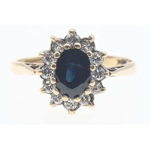 1034 - 9ct gold, sapphire and CZ ring, size L1/2, gross weight 2.4 grams