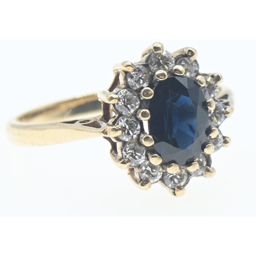 1034 - 9ct gold, sapphire and CZ ring, size L1/2, gross weight 2.4 grams