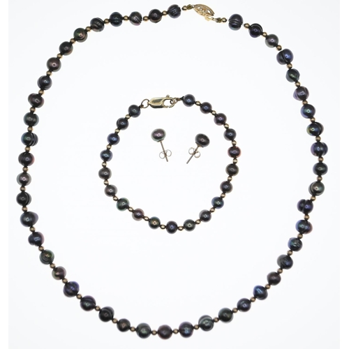 1052 - Tahitian off round circle pearl necklace with 14ct gold clasp, circumference 460mm, a bracelet with ... 