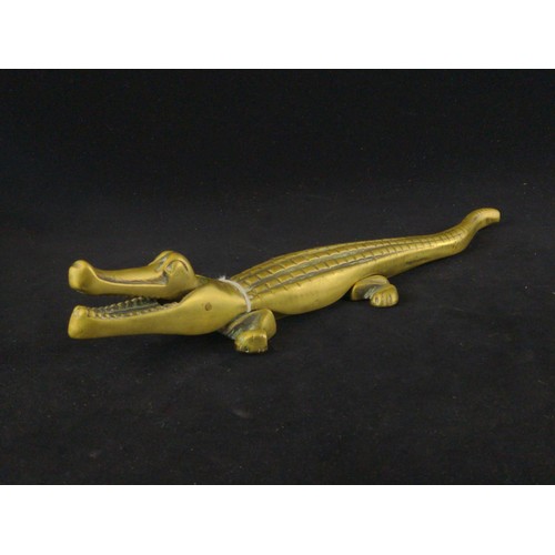 549A - Novelty brass crocodile nut cracker, length 34cm