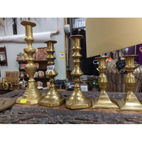 680A - 5 x brass candlesticks inc. 2 pairs 