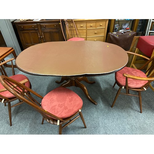 699 - Dark wood Ercol extending dining table with two dining chairs and two carver chairs. ( seat pads are... 