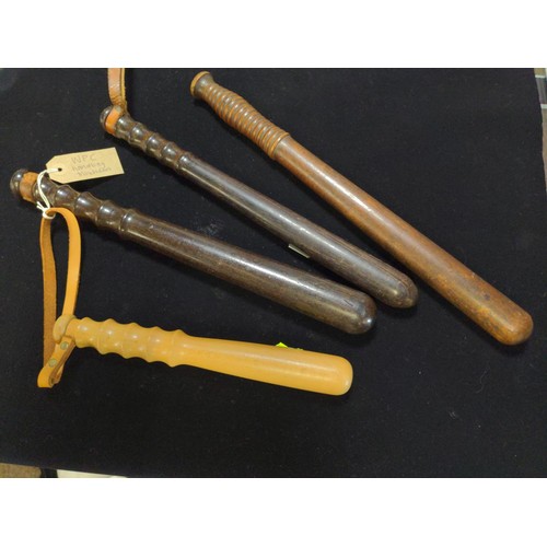 1147 - Four truncheons inc. WPC handbag truncheon and three Victorian truncheons (one with strap, two witho... 