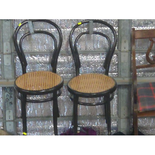 708 - Pair of cane seated French style cafe chairs