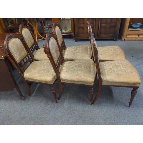 704 - 6 C19 Walnut dining chairs, with reeded supports and finials to backrest outer edge. Horse-hair fill... 