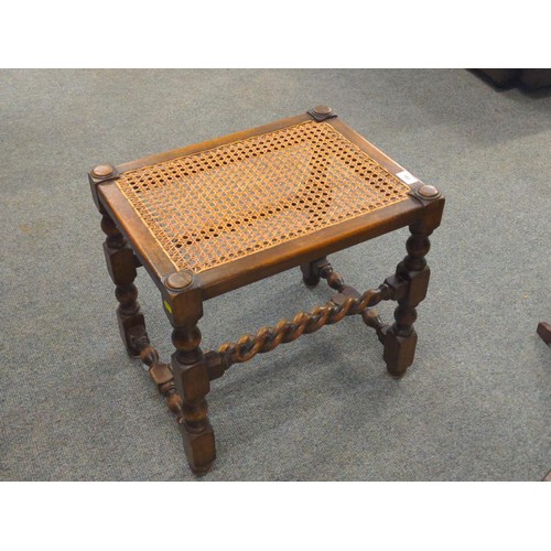 703 - Oak cane topped stool. W51cm D38cm H47cm