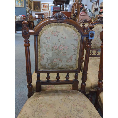 704 - 6 C19 Walnut dining chairs, with reeded supports and finials to backrest outer edge. Horse-hair fill... 