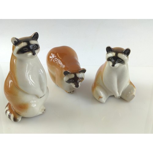 601 - Set of three Russian red panda porcelain figures, height of tallest 14.5cm