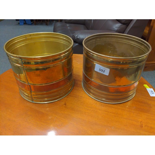 592 - Pair of copper banded brass planters, Lombard England stamped to base, dia. 19 x H15cm