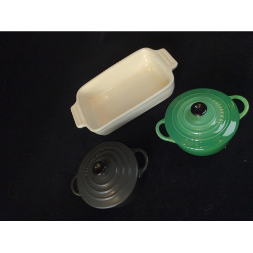 586 - Two small lidded Le Creuset (0.25L) casseroles together with a small Le Creuset baking dish and two ... 