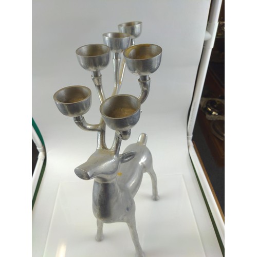 621 - Aluminium reindeer candelabra and ornate silver gilt resin candlestick, height of reindeer 49cm