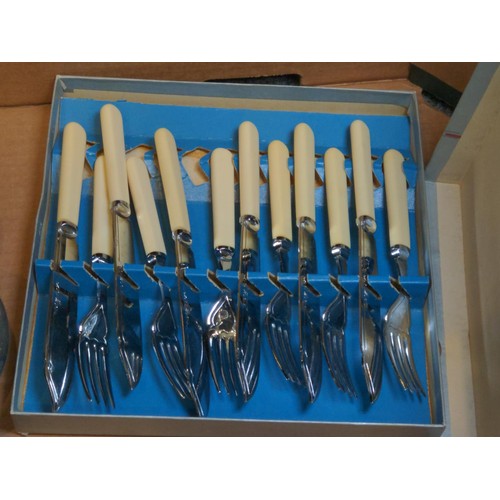 629 - Quantity of plated and stainless steel flatware in canteens and loose.